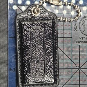 Coach Metallic Black Leather Hangtag